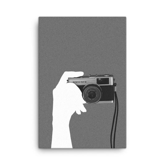 Camera in hand black and white canvas print 