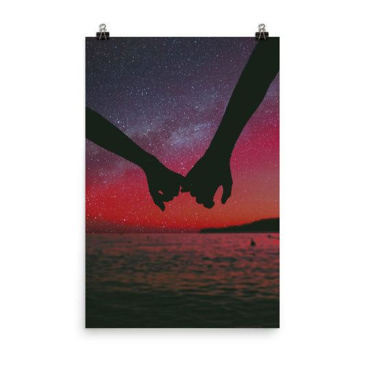 holding hands in the sunset with galaxy sky 