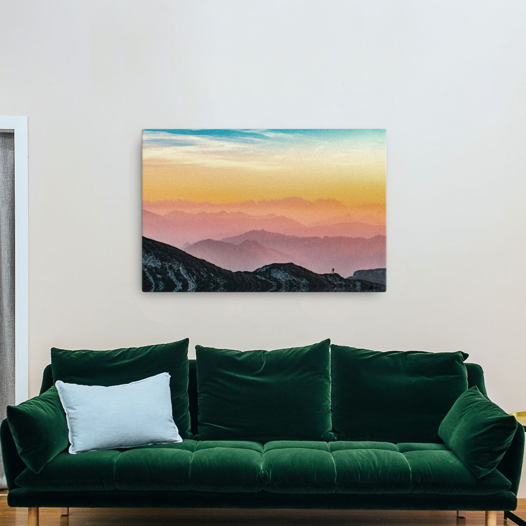 Mockup image of the artwork "Altmünster Mountains Sunset Canvas Art Print" depicting the majestic peaks of Altmünster in Upper Austria during a captivating sunset. The warm, golden hues and vibrant colors of the sunset create a mesmerizing and enchanting scene.