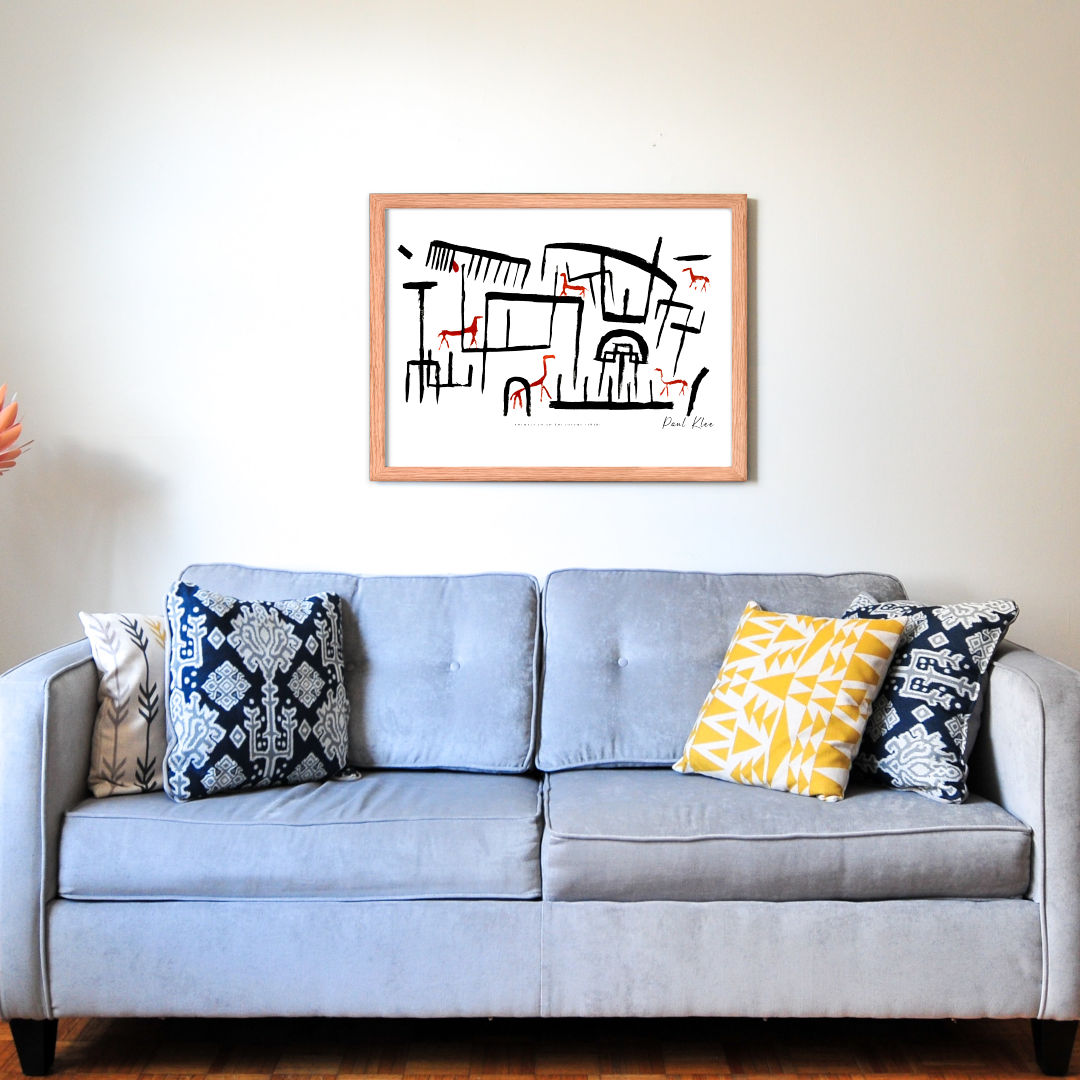 Mockup image of the framed artwork "Animals in an Enclosure" by Paul Klee. The whimsical composition features vibrant animals and geometric elements, creating a captivating and harmonious scene. The artwork is showcased in a [black/white/red oak] frame, available in various sizes.