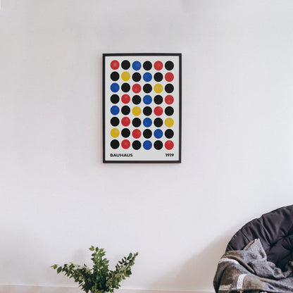 Bauhaus Dots print with multicoloured circles in a black frame – classic 1919 design for Bauhaus art collectors.