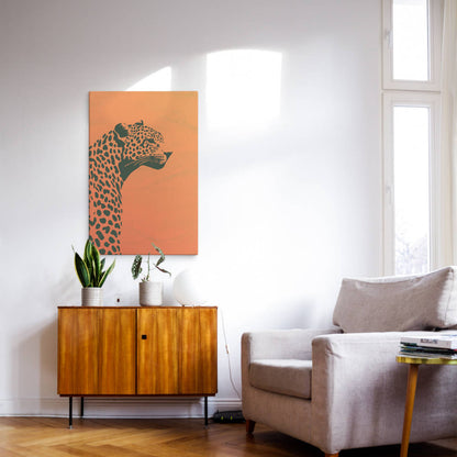 Dusk Cheetah canvas print on a wall in a cozy room with a wooden cabinet and armchair, enhancing modern and boho home decor.

