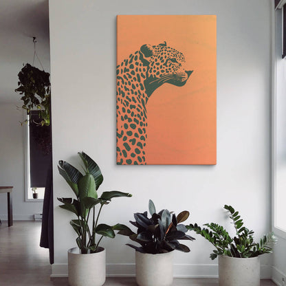 Dusk Cheetah canvas print on a wall in a modern room with green houseplants, showcasing nature-inspired wall art for boho decor.