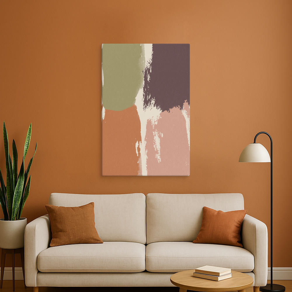 A warm-toned abstract canvas print in brown, beige, and muted green shades is displayed above a cozy cream-colored sofa. The earthy orange accent wall provides a rich backdrop, making the artwork seamlessly blend with the room's natural aesthetic.