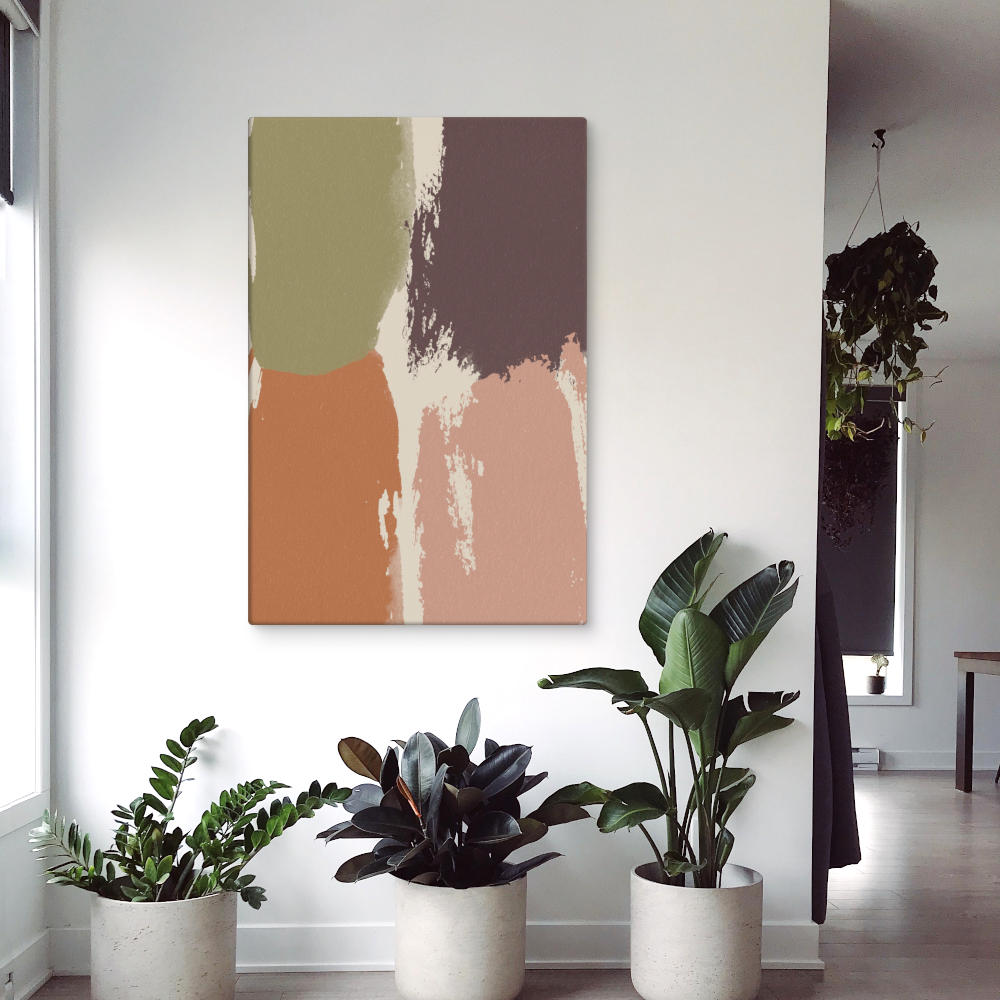 A large earthy-toned abstract canvas print hangs in a bright, plant-filled space. The artwork features soft brushstrokes in natural hues, perfectly complementing the room's indoor greenery and white walls.