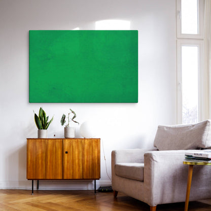 Modern living room featuring vibrant pantone green canvas wall art above minimalist furniture. Stylish living room pictures ideal for contemporary interior design and gallery wall arrangements.