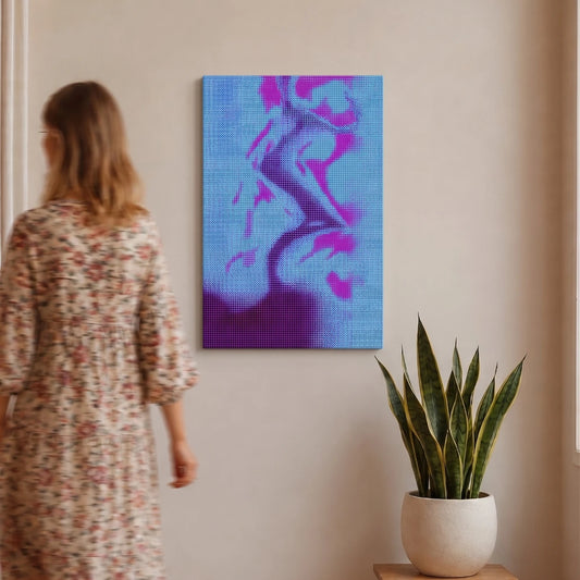 A blue and purple abstract art canvas hangs on a wall next to a potted snake plant, with a woman in a floral dress walking away in the background.