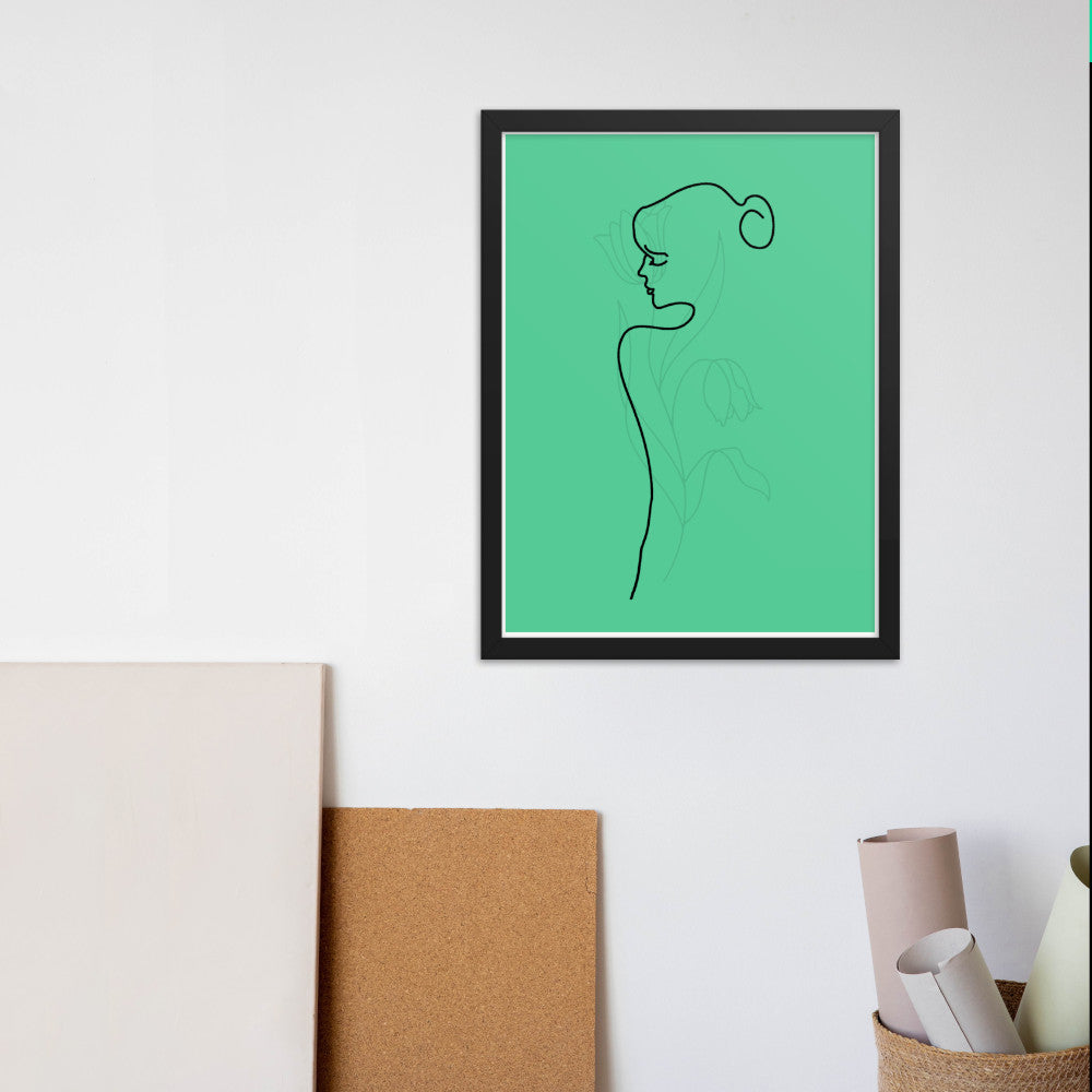 lined body and rose in green black frame on wall