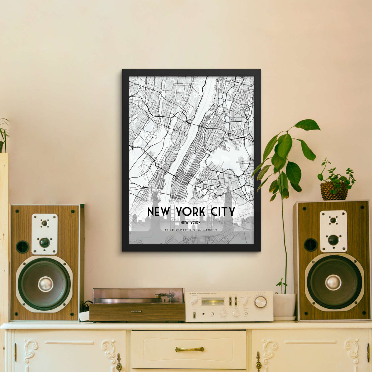 A sleek and modern framed poster of New York City, featuring a detailed aerial view of the city’s skyline with a monochrome finish.