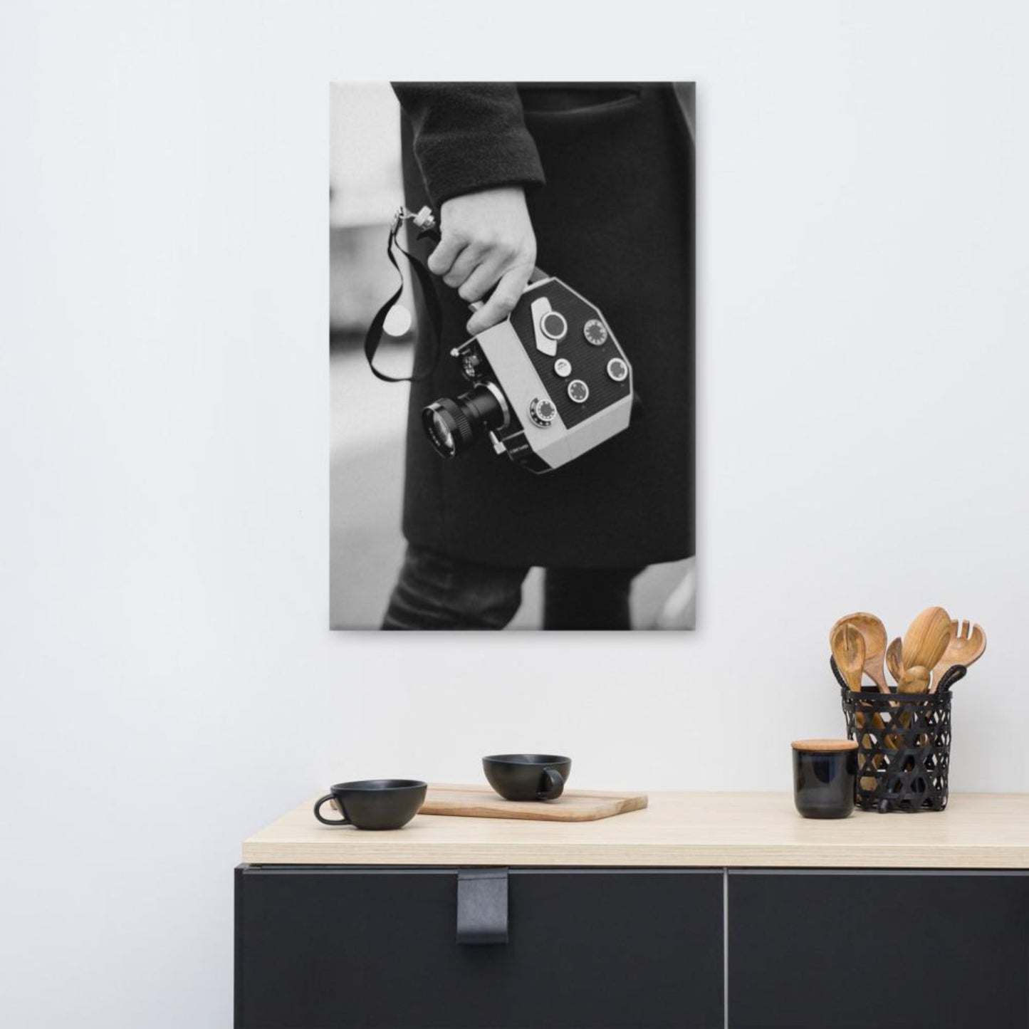 super 8 hand held camera in black and white vintage canvas wall art mock-up